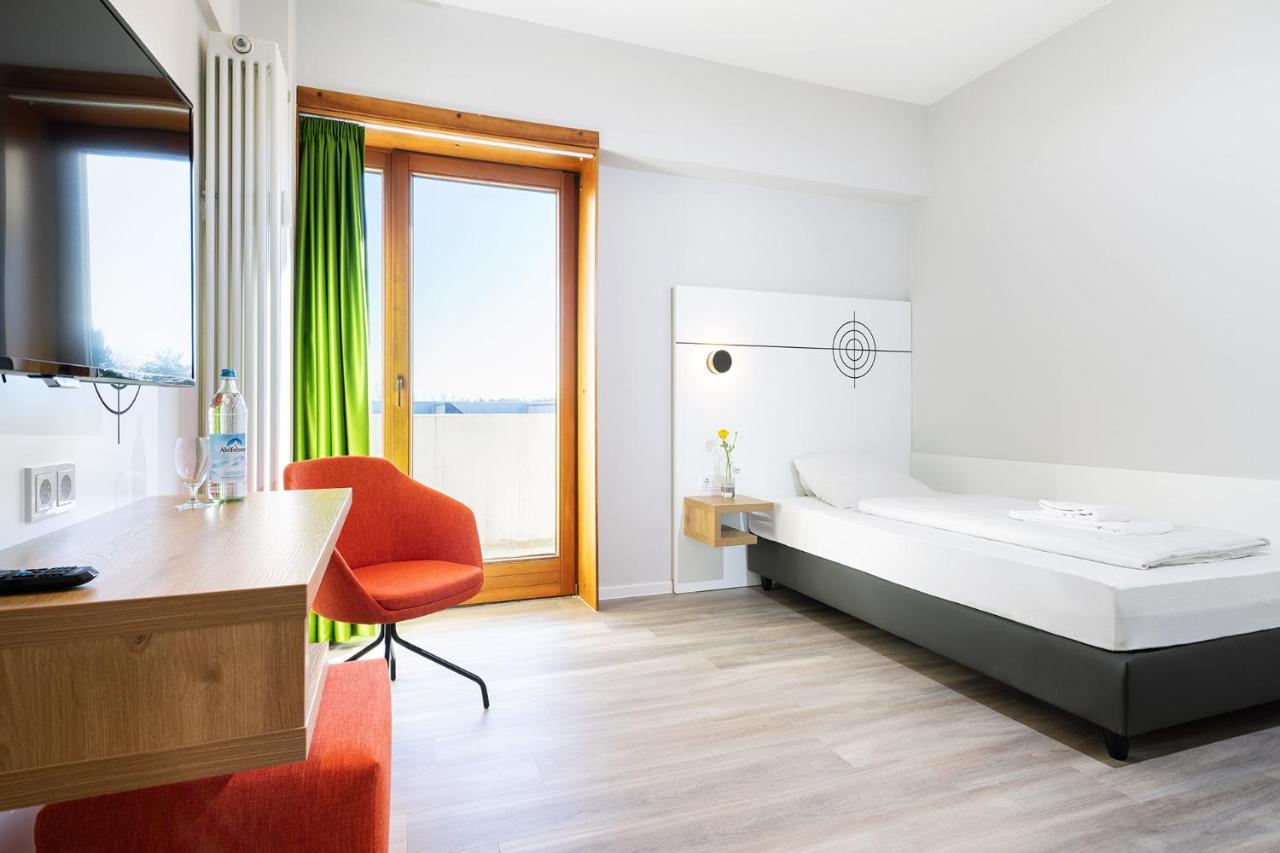 Hotel Olympia Schiessanlage Garching bei München Extérieur photo
